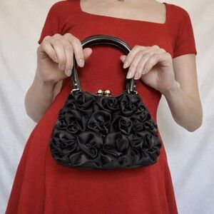 Adorable acrylic handle Satin rosettes satchel